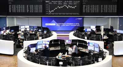 Image for Stocks steady, yields dip ahead of action-packed week