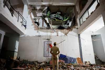 Image for Authorities identify all but one of 260 victims of Air India plane crash