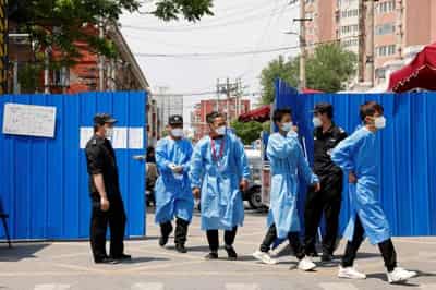 Image for Factbox-COVID-hit Chinese cities seek exit from painful lockdown