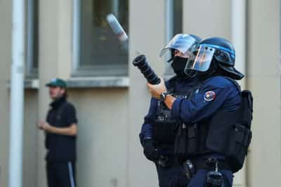 Image for France suspends use of stun grenades to police student protests