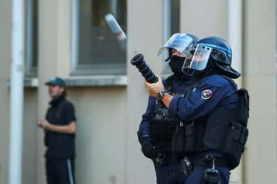 Image for France suspends use of stun grenades to police student protests
