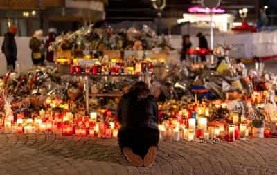 Image for Swiss court keeps bar owner in custody after deadly fire