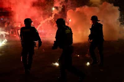 Image for Two hundred hurt in post-game violence as Paris hails second Champions League triumph
