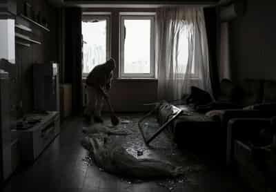 Image for Ukraine toils to restore power and heat, Zelenskiy warns of new attack