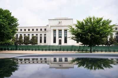 Image for Wall St heads higher as Fed rate hopes dent dollar