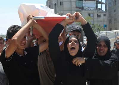 Image for Israeli strikes kill two people in Gaza, including a 10-year-old, medics say