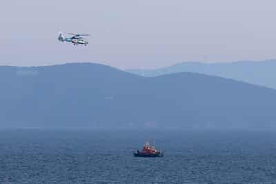 Image for Fifteen migrants die after boat collides with Greek coast guard vessel off island of Chios