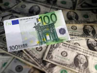 Image for Dollar climbs, euro weakens to two-year low after PMI data