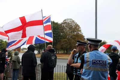 Image for UK police arrest five in London during anti-asylum protest