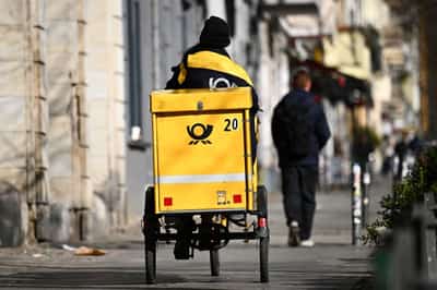 Image for Deutsche Post plans hikes to German letter postage rates to offset rising costs