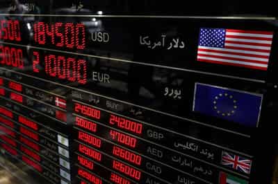 Image for Dollar feeble as rate hike bets dwindle, Iran conflict in focus