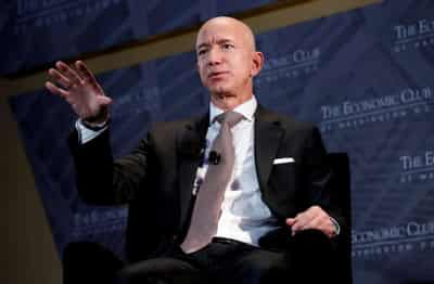 Image for Bezos, Musk top Forbes&#8217; record-setting billionaire list