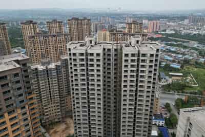 Image for China slashes mortgage reference rates to revive property market