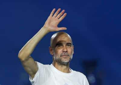 Image for Soccer-Guardiola's office contents, including coffee cups and ceramic turtles, up for auction