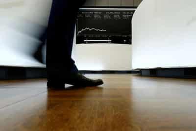 Image for Global stocks to grind higher, lacklustre year ahead: Reuters poll