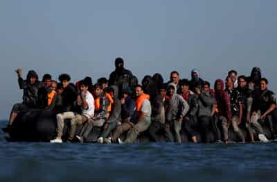 Image for Britain suspends refugees' family reunion applications to toughen rules
