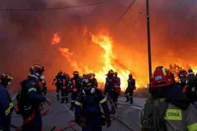 Image for Hundreds of firefighters battle wildfires on Greece's Chios island for third day