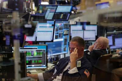 Image for Wall Street futures slide as Trump's new tariffs, Amazon weigh