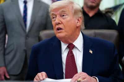 Image for Trump hits back at German chancellor after Iran criticism