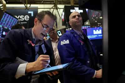 Image for Stocks, bond prices ease in see-saw session as investors mull ‘soft landing’