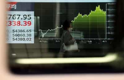 Image for Asian shares track Wall Street to record highs but higher oil prices a risk