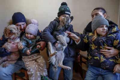 Image for The Kyiv family, with its pets and pigs, defying Russia and the cold