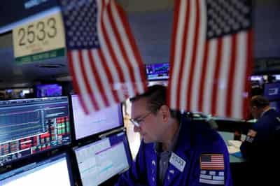 Image for Stocks notch seven straight months of gains, dollar flat