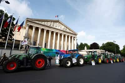 Image for French farmers bring tractors to Paris to press for looser rules