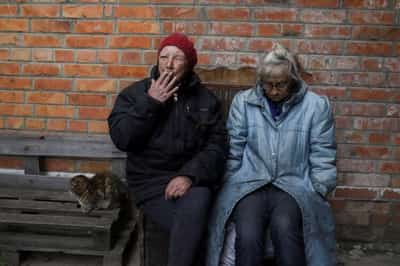 Image for One war, two worlds: Ukraine neighbours face shelling with defiance or despair
