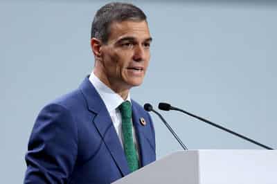 Image for Spanish PM's Socialist party slips in poll as graft scandal takes toll