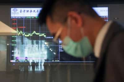 Image for Global shares jump but bank ‘whack-a-mole’ not over