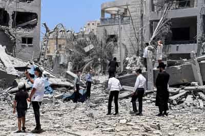 Image for Israeli resilience tested as Iranian missile strikes hit home