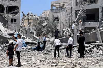Image for Israeli resilience tested as Iranian missile strikes hit home