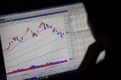 Image for Stock indexes register records after upbeat company forecasts; oil drops