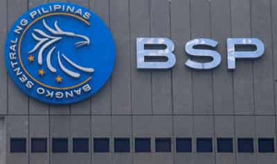 Image for Philippine central bank holds rates at record low, signals no change anytime soon