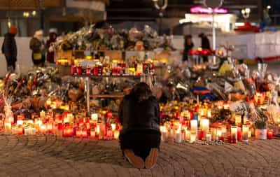 Image for Swiss families file legal complaint over New Year's bar fire