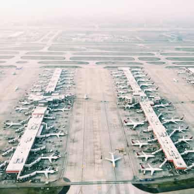 Image for Two charged with offences over Manchester Airport incident in July