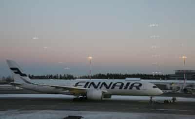 Image for Finland warns of drone activity in capital region, shuts traffic at Helsinki airport