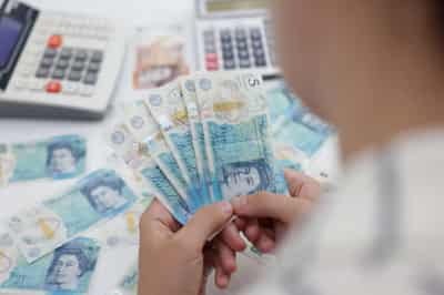 Image for Analysis-A year after budget crisis, UK debt faces fresh pensions headwind