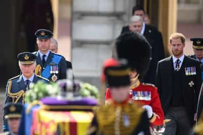 Image for William and Harry walk together behind a loved one’s coffin, again
