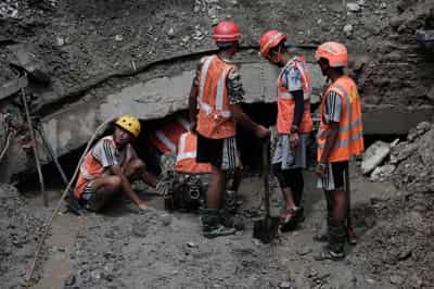 Image for Two people rescued alive from Nepal hydropower tunnel