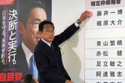 Image for Mourners throng Abe’s wake as his party secures sombre Japan election win