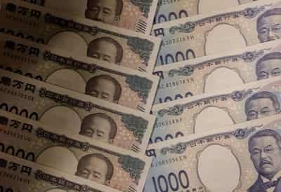 Image for Yen eases on risk-on mood ahead of central bank bonanza
