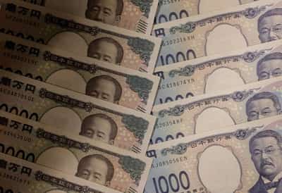 Image for Yen eases on risk-on mood ahead of central bank bonanza