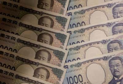 Image for Yen eases on risk-on mood ahead of central bank bonanza