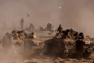 Image for Thousands of Israeli reservists report for duty as military chief clashes with ministers