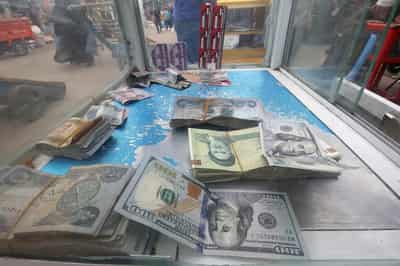 Image for Dollar jumps, traders pare rate cut bets after strong jobs report