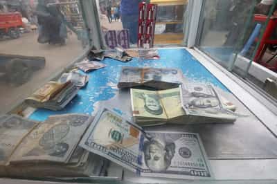 Image for Dollar jumps, traders pare rate cut bets after strong jobs report