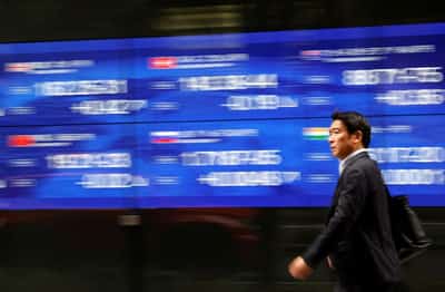 Image for Stocks rise, yen strengthens against dollar as intervention eyed
