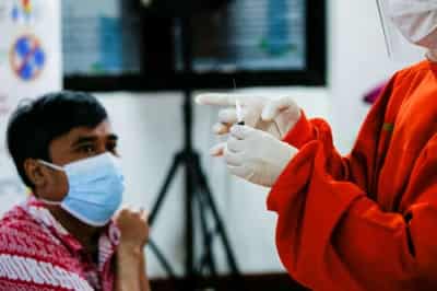 Image for Chickens, cows, apartments offered up in Asia&#8217;s vaccination lucky draws